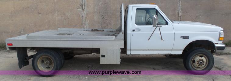 image for item K8295 1997 Ford F350 XL flatbed pickup truck