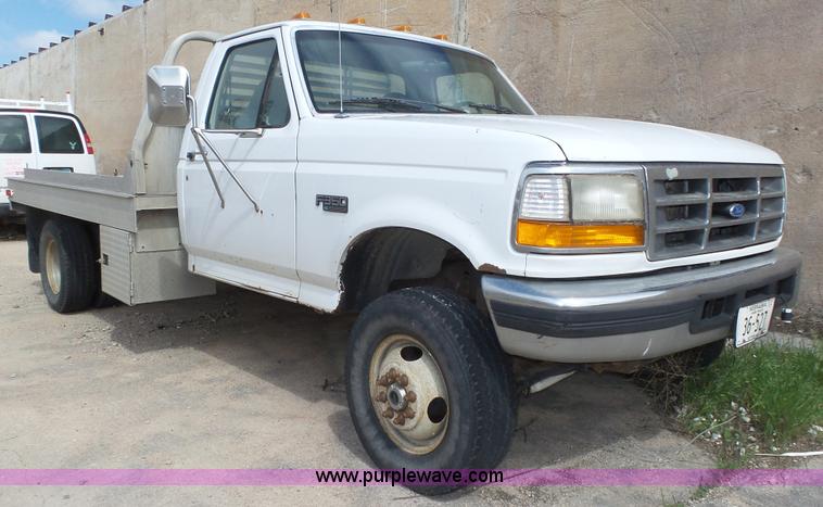 image for item K8295 1997 Ford F350 XL flatbed pickup truck