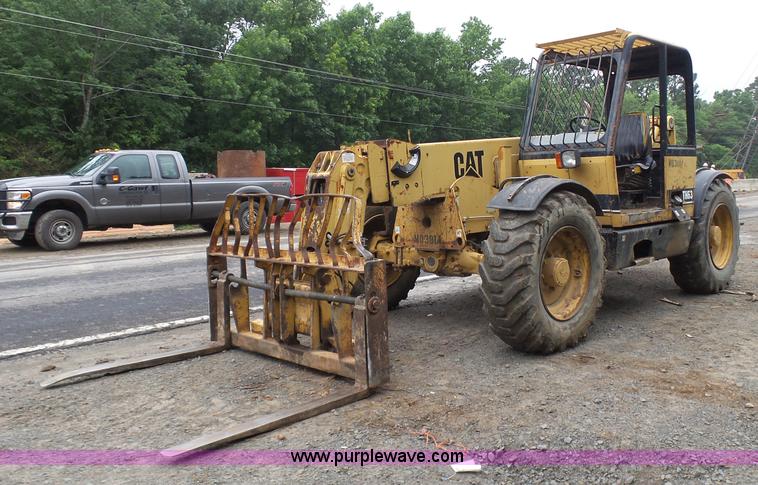 image for item K7145 1999 Caterpillar TH63 telehandler