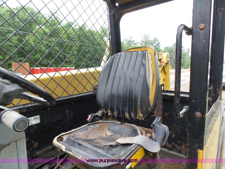 image for item K7145 1999 Caterpillar TH63 telehandler