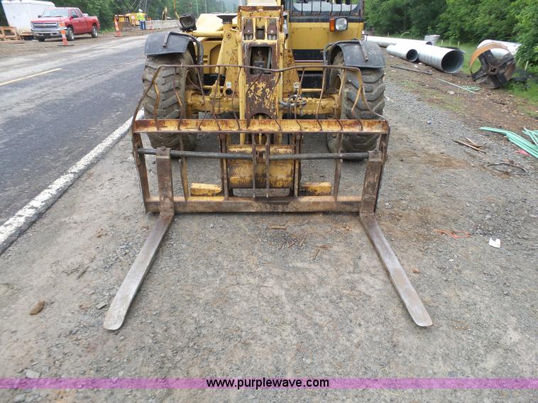 image for item K7145 1999 Caterpillar TH63 telehandler