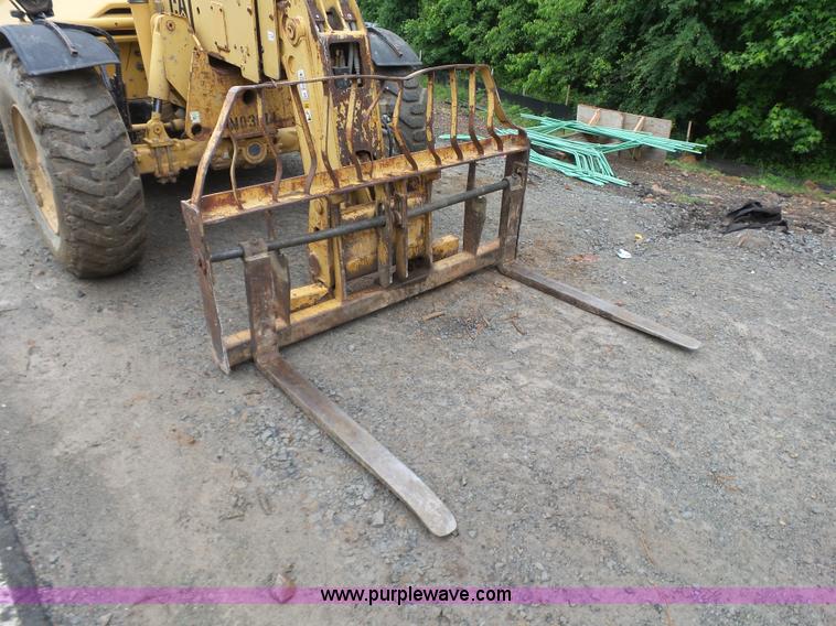 image for item K7145 1999 Caterpillar TH63 telehandler