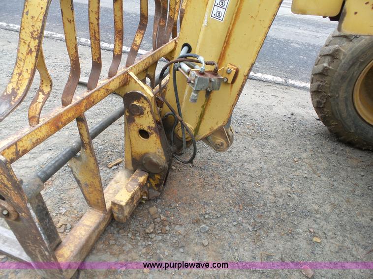 image for item K7145 1999 Caterpillar TH63 telehandler