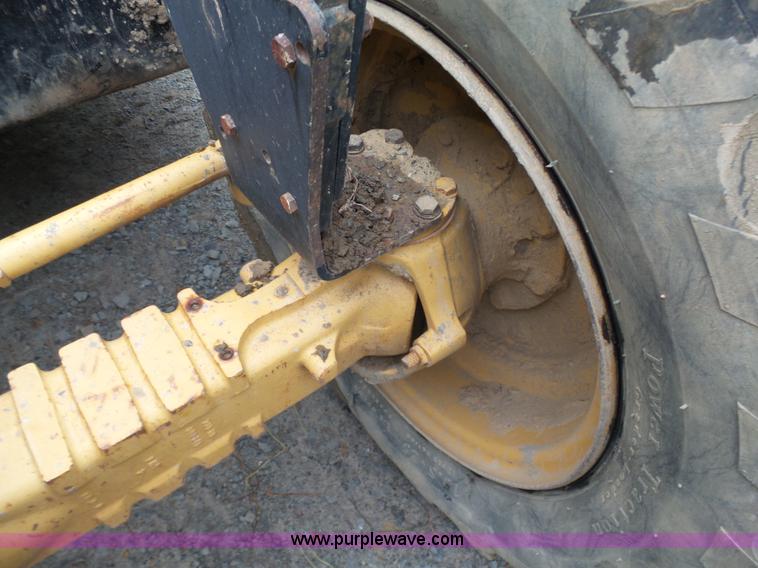 image for item K7145 1999 Caterpillar TH63 telehandler