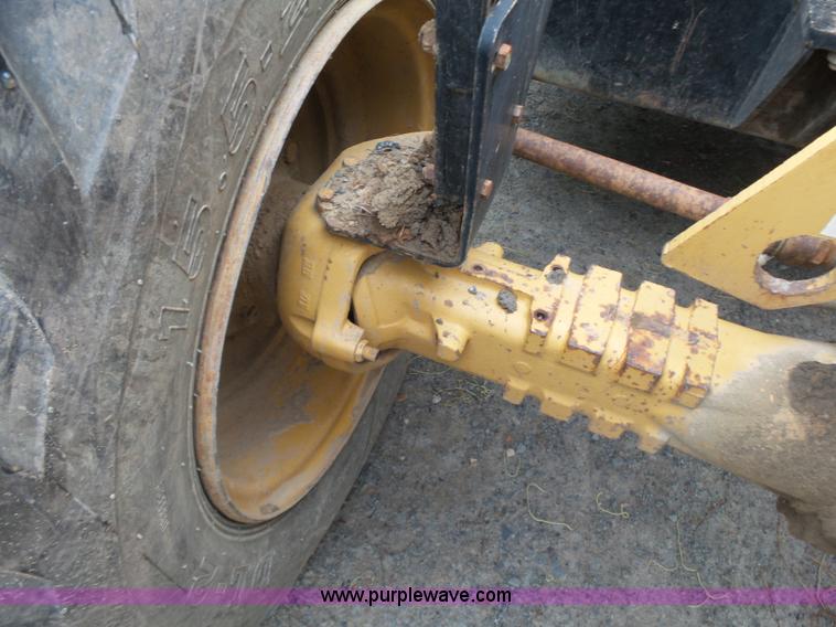 image for item K7145 1999 Caterpillar TH63 telehandler