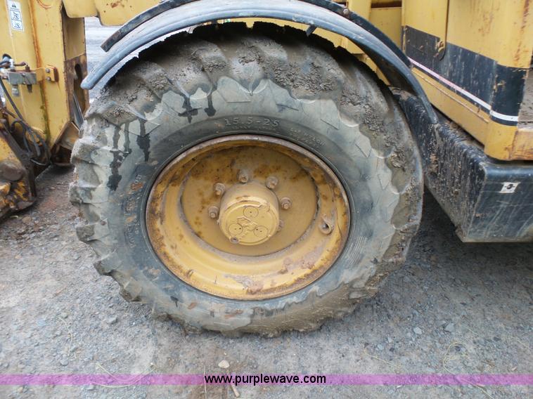 image for item K7145 1999 Caterpillar TH63 telehandler