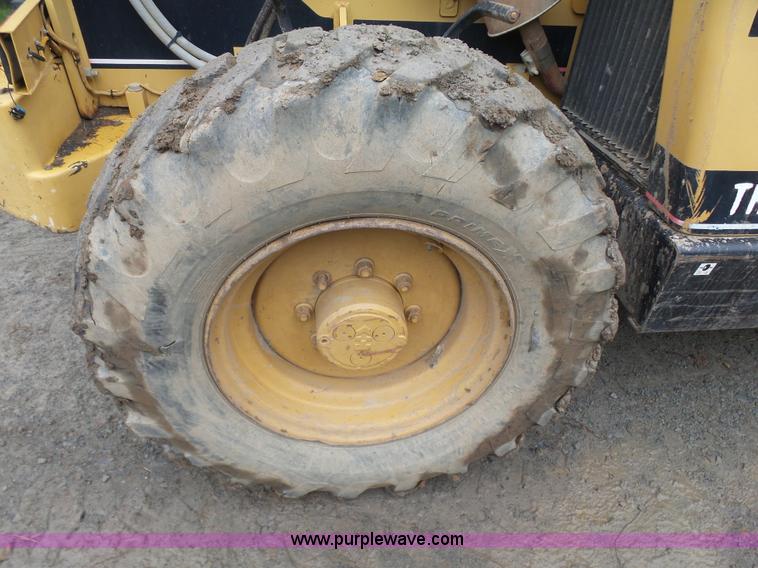 image for item K7145 1999 Caterpillar TH63 telehandler