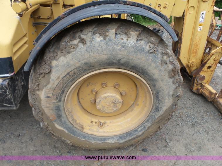 image for item K7145 1999 Caterpillar TH63 telehandler