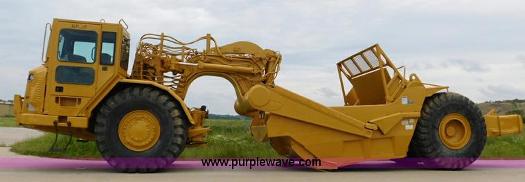 image for item K7150 2001 Caterpillar 621G conventional scraper