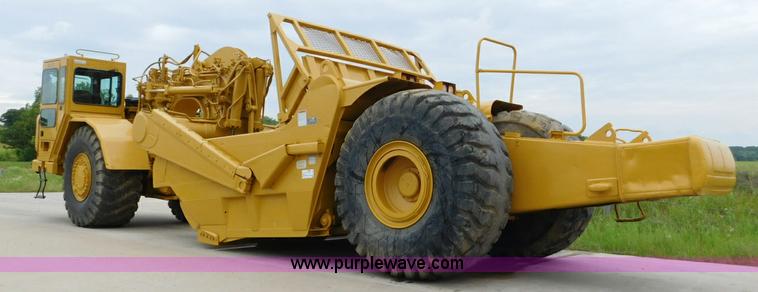 image for item K7150 2001 Caterpillar 621G conventional scraper