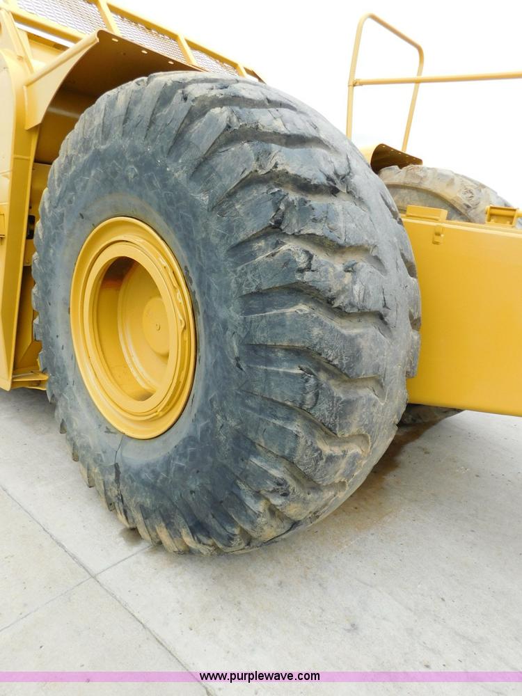 image for item K7150 2001 Caterpillar 621G conventional scraper