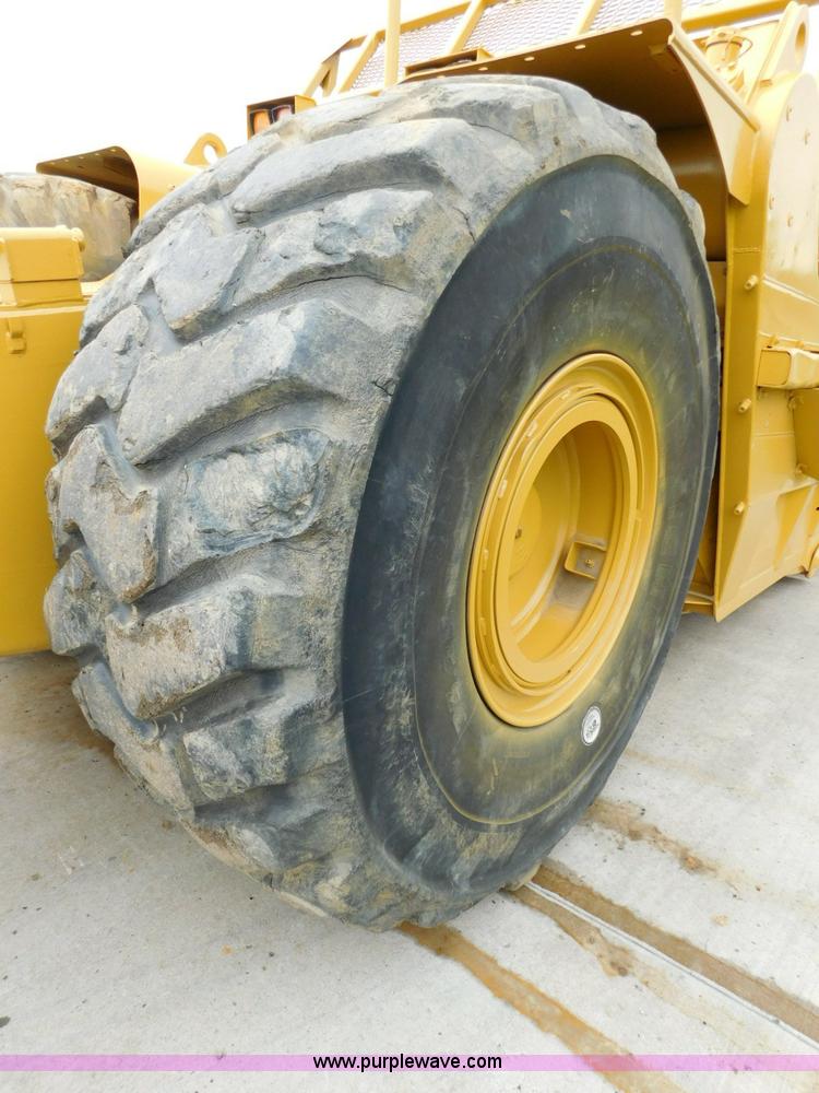 image for item K7150 2001 Caterpillar 621G conventional scraper