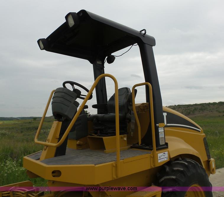 image for item K7161 2003 Caterpillar CP-433E vibratory padfoot roller