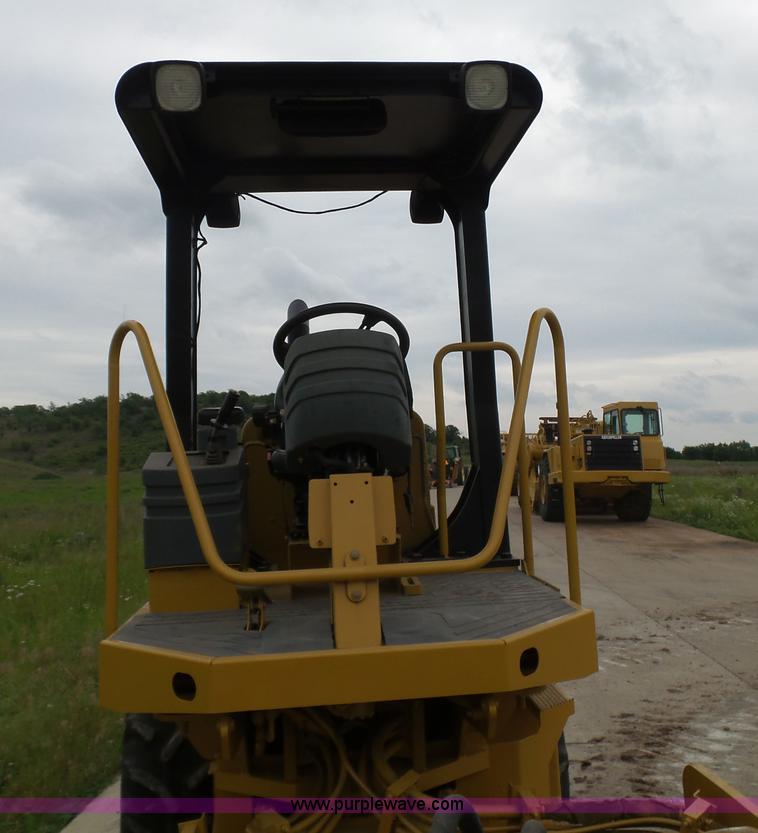 image for item K7161 2003 Caterpillar CP-433E vibratory padfoot roller