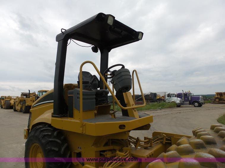 image for item K7161 2003 Caterpillar CP-433E vibratory padfoot roller