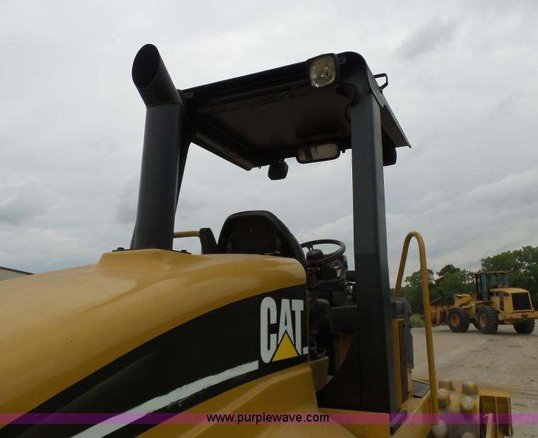 image for item K7161 2003 Caterpillar CP-433E vibratory padfoot roller