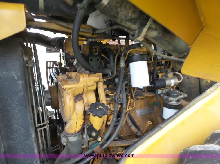 image for item K7161 2003 Caterpillar CP-433E vibratory padfoot roller