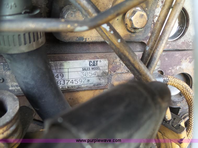 image for item K7161 2003 Caterpillar CP-433E vibratory padfoot roller