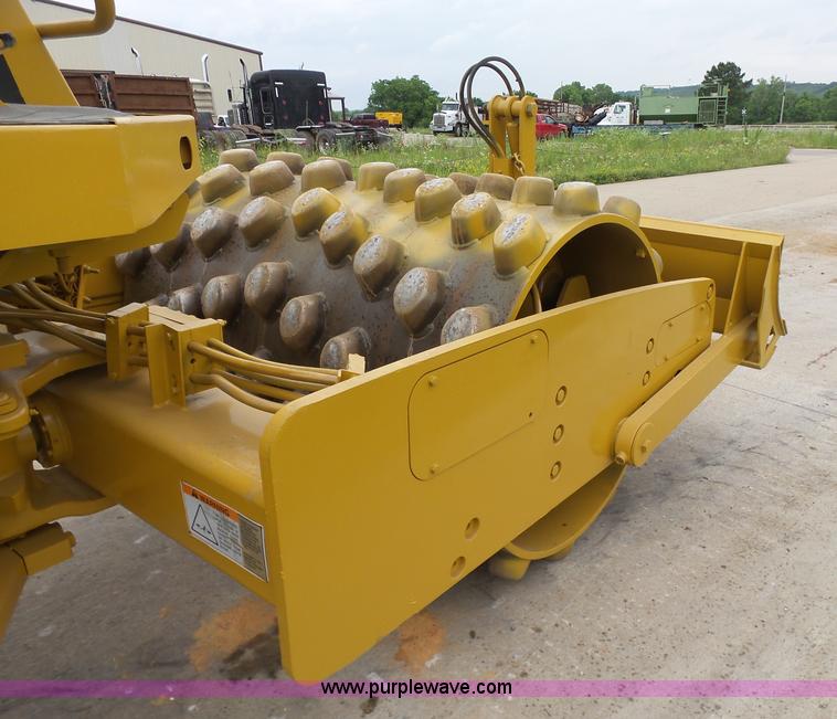 image for item K7161 2003 Caterpillar CP-433E vibratory padfoot roller
