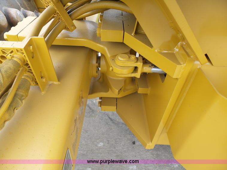 image for item K7161 2003 Caterpillar CP-433E vibratory padfoot roller