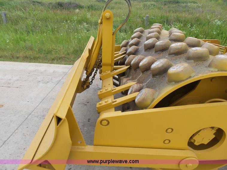 image for item K7161 2003 Caterpillar CP-433E vibratory padfoot roller