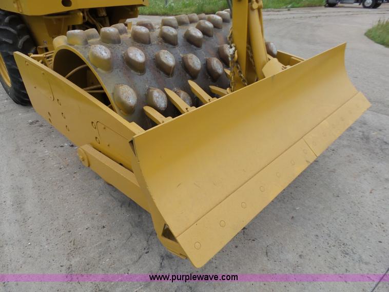 image for item K7161 2003 Caterpillar CP-433E vibratory padfoot roller