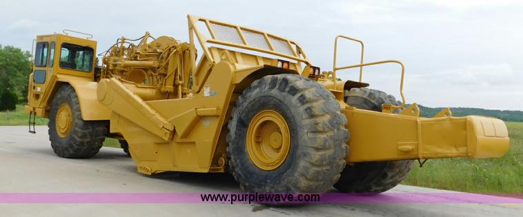 image for item K7164 2001 Caterpillar 621G conventional scraper