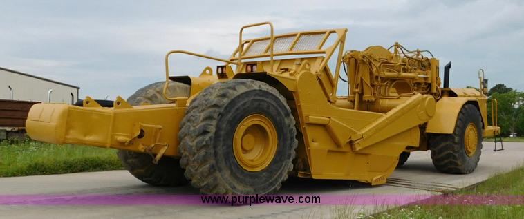 image for item K7164 2001 Caterpillar 621G conventional scraper
