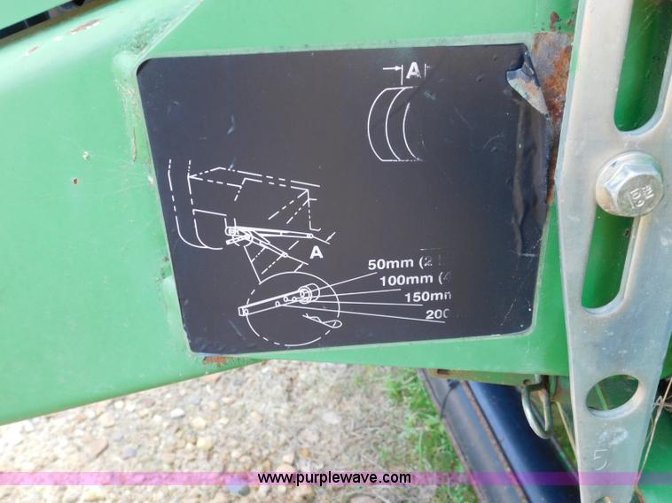 image for item L5850 2008 John Deere 568 Mega Wide Plus round baler