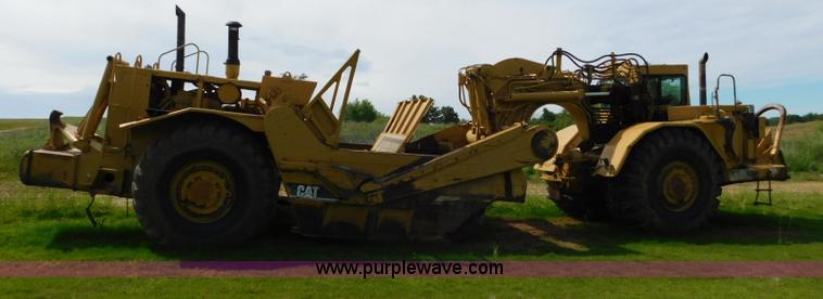 image for item L5851 1999 Caterpillar 627F conventional scraper