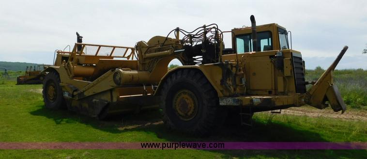 image for item L5851 1999 Caterpillar 627F conventional scraper