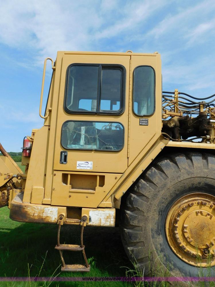 image for item L5851 1999 Caterpillar 627F conventional scraper