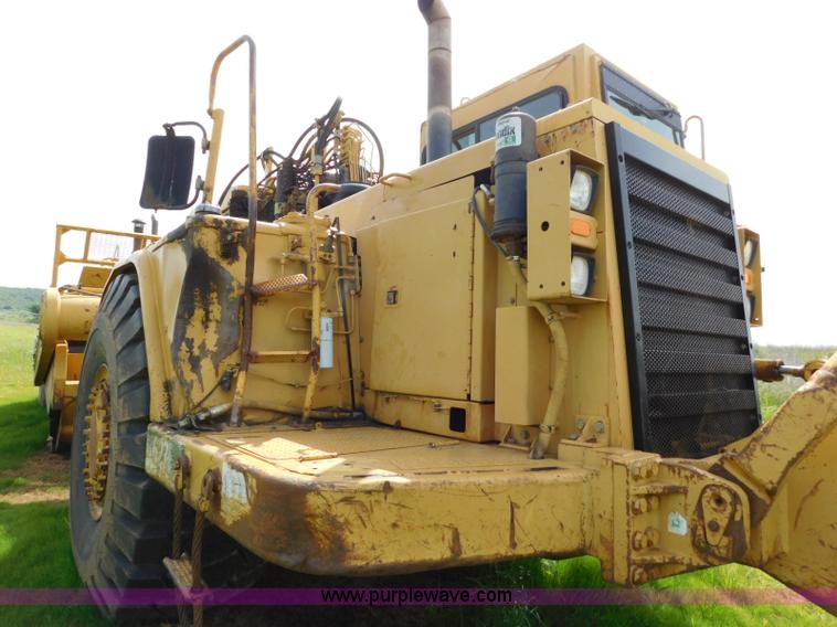 image for item L5851 1999 Caterpillar 627F conventional scraper