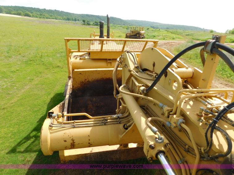 image for item L5851 1999 Caterpillar 627F conventional scraper