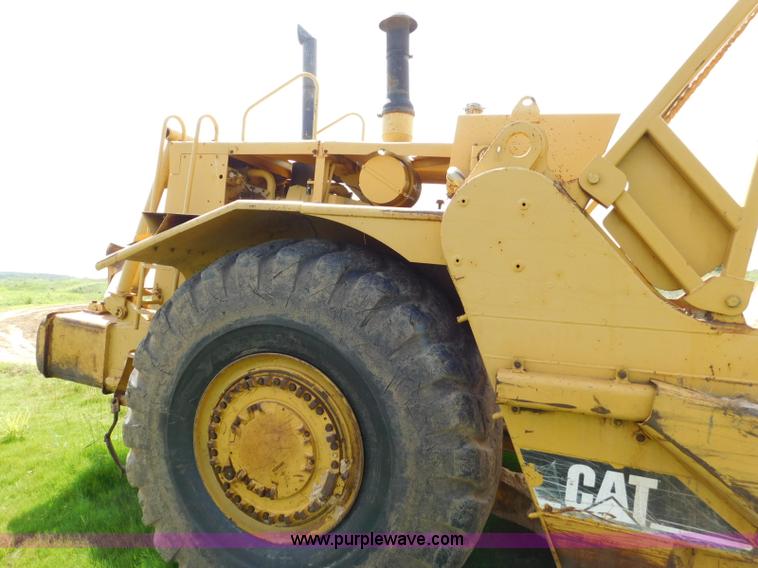 image for item L5851 1999 Caterpillar 627F conventional scraper