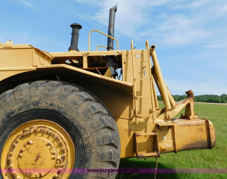 image for item L5851 1999 Caterpillar 627F conventional scraper