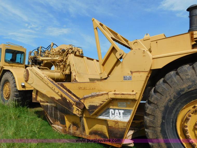 image for item L5851 1999 Caterpillar 627F conventional scraper