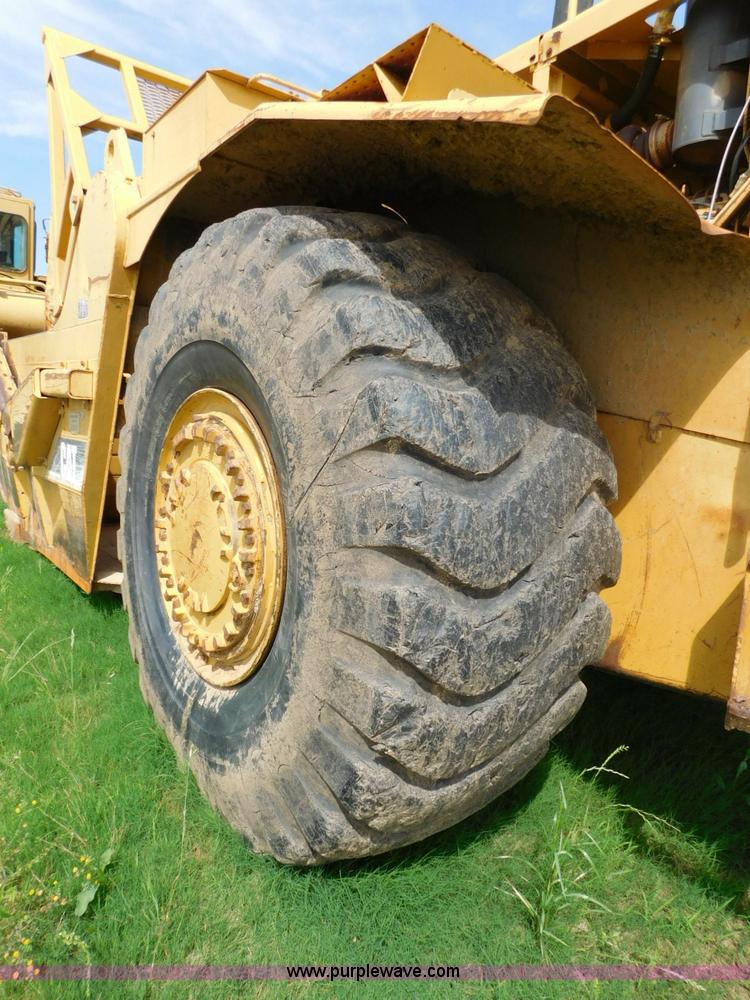 image for item L5851 1999 Caterpillar 627F conventional scraper