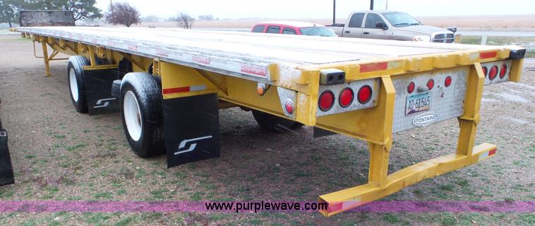 image for item K6832 1999 Fontaine LFTW-5-8053WSWK flatbed trailer