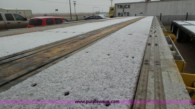 image for item K6832 1999 Fontaine LFTW-5-8053WSWK flatbed trailer