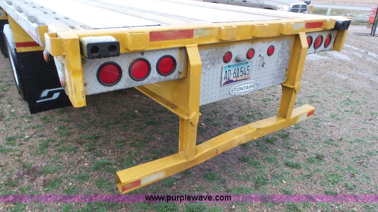 image for item K6832 1999 Fontaine LFTW-5-8053WSWK flatbed trailer