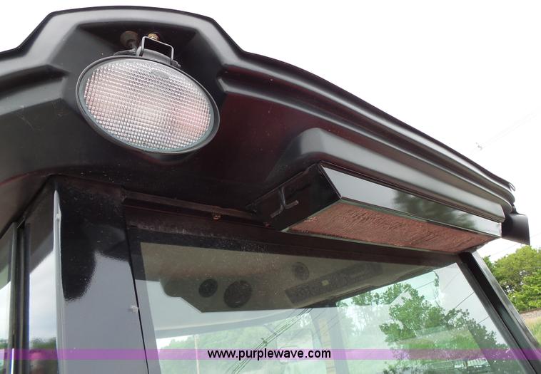 image for item J4951 2013 Massey-Ferguson WR9770 self-propelled windrower