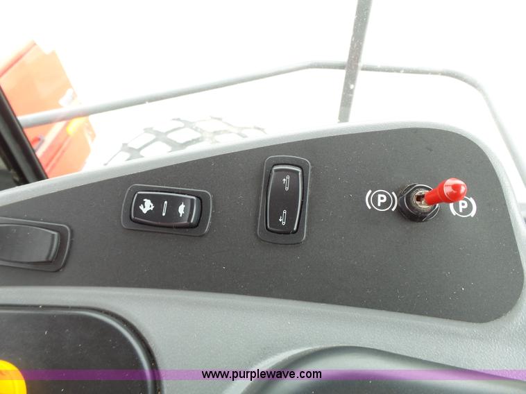 image for item J4951 2013 Massey-Ferguson WR9770 self-propelled windrower