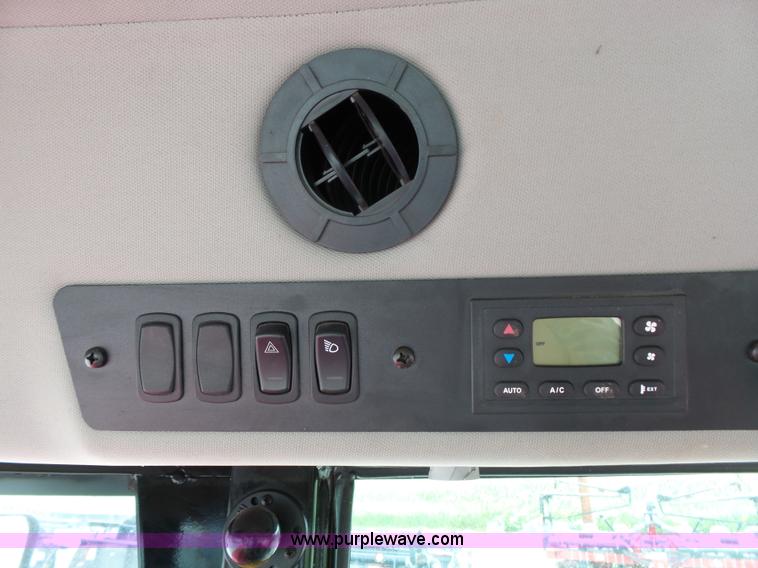 image for item J4951 2013 Massey-Ferguson WR9770 self-propelled windrower