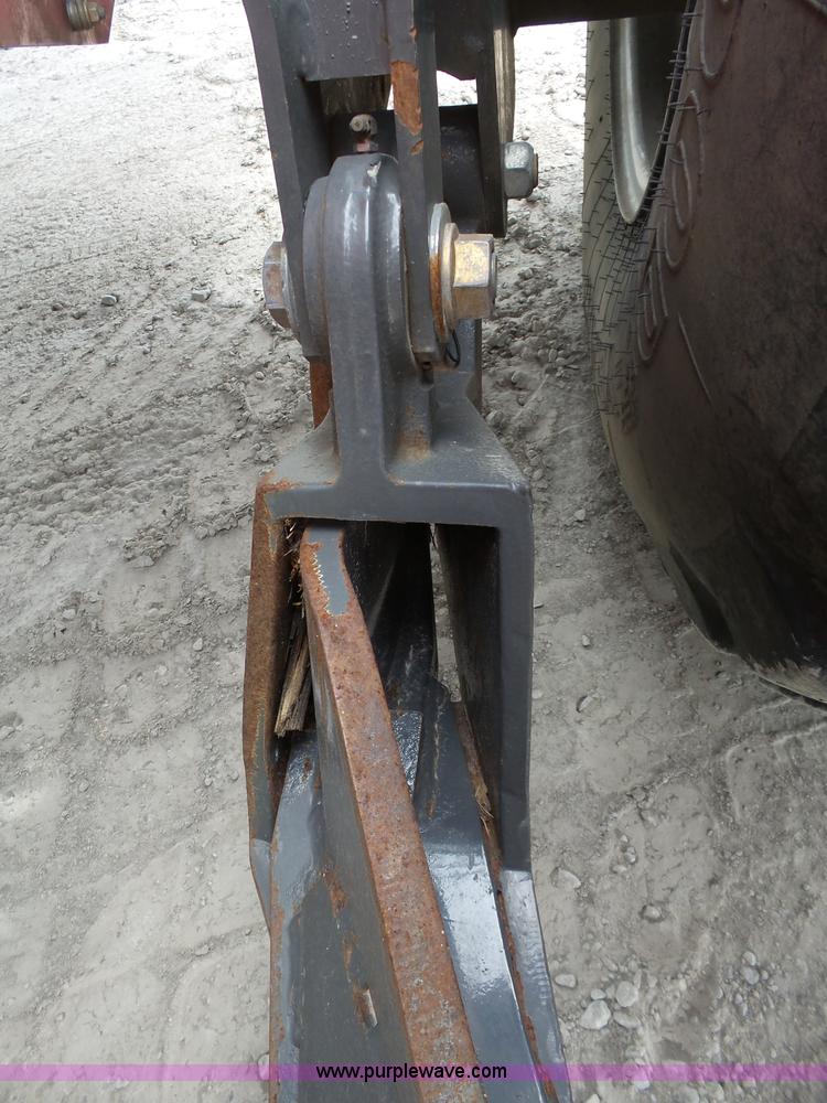 image for item J4951 2013 Massey-Ferguson WR9770 self-propelled windrower