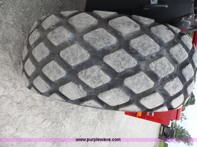 image for item J4951 2013 Massey-Ferguson WR9770 self-propelled windrower