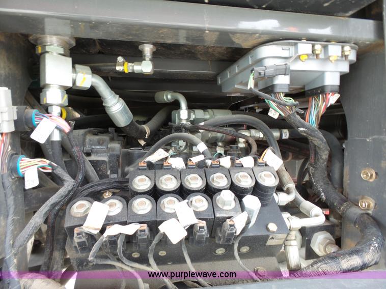 image for item J4951 2013 Massey-Ferguson WR9770 self-propelled windrower