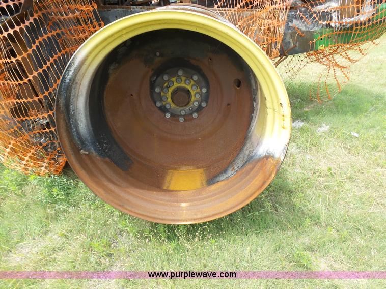 image for item J6095 2011 John Deere 9430 4WD tractor