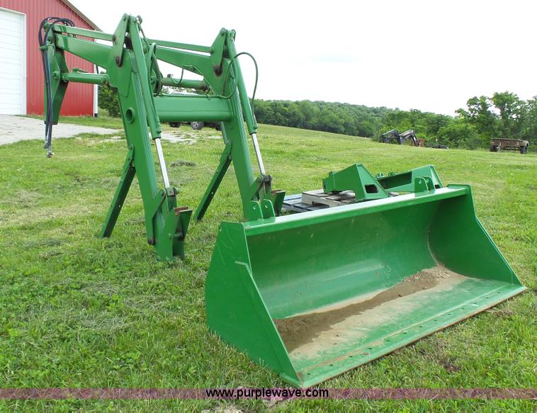 image for item K4039 John Deere 640 loader
