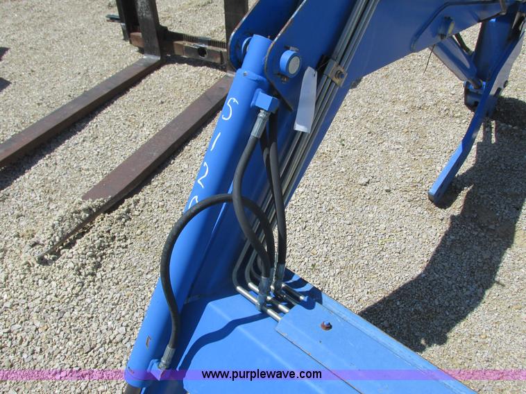 image for item K4718 New Holland 7310 loader